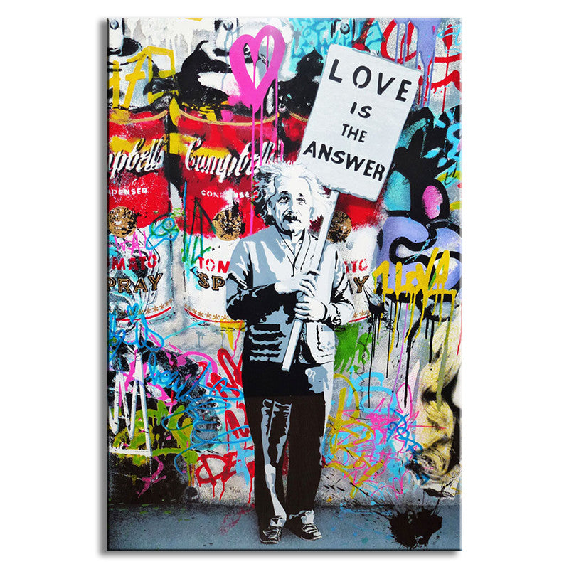 Love Is The Answer - Banksy street art canvas print featuring black and white figure holding protest sign against vibrant graffiti wall with Campbell's soup cans and colorful spray paint designs in urban style
