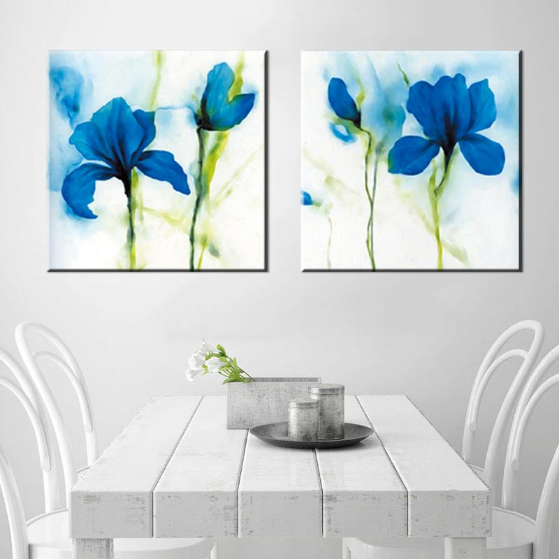 Blue Flower, Abstract Accents - 2 Piece: Elegant watercolor-style canvas art featuring vibrant blue iris flowers with delicate green stems against a soft white background, displayed as a diptych wall decor set