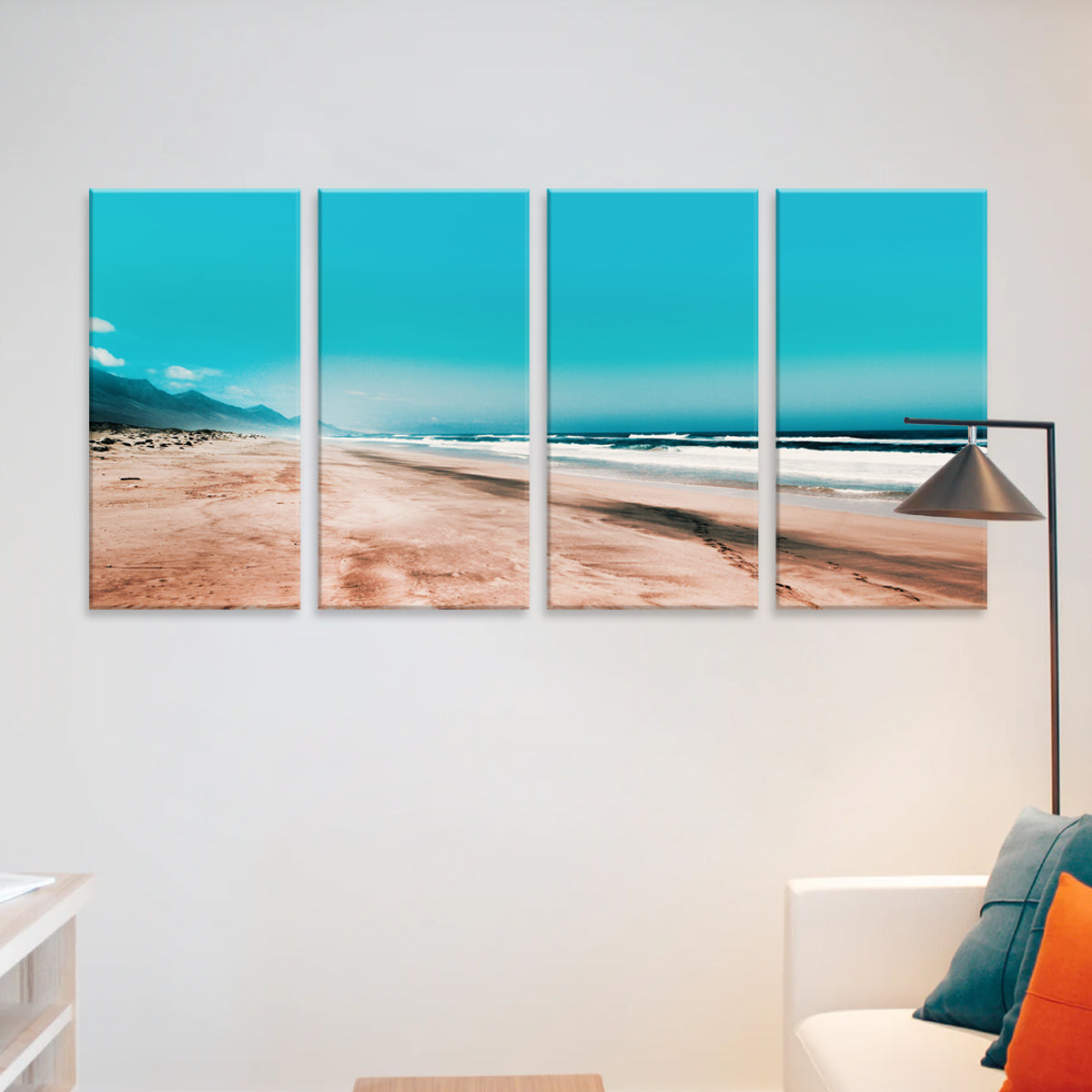 Sandy Beach - 4-panel canvas wall art featuring a serene coastal landscape with turquoise ocean waves meeting pristine sandy shores under bright blue skies, with distant mountains creating a peaceful beachside panorama