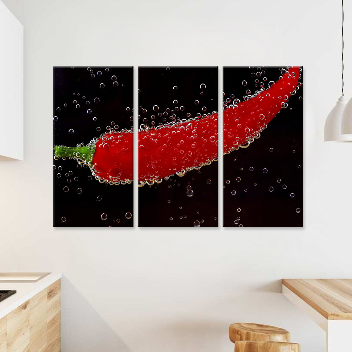 Chili Pepper wall art featuring a vibrant red chili surrounded by bubbles against a black background, displayed as a striking three-panel canvas print for modern home decor