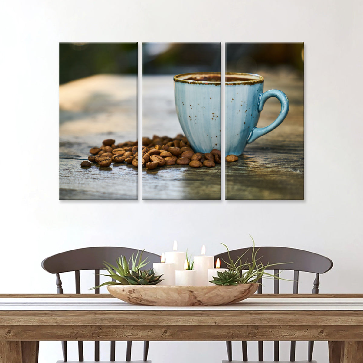 Coffee wall art featuring a light blue ceramic cup filled with fresh coffee, surrounded by scattered roasted coffee beans on rustic wooden surface, split into three canvas panels