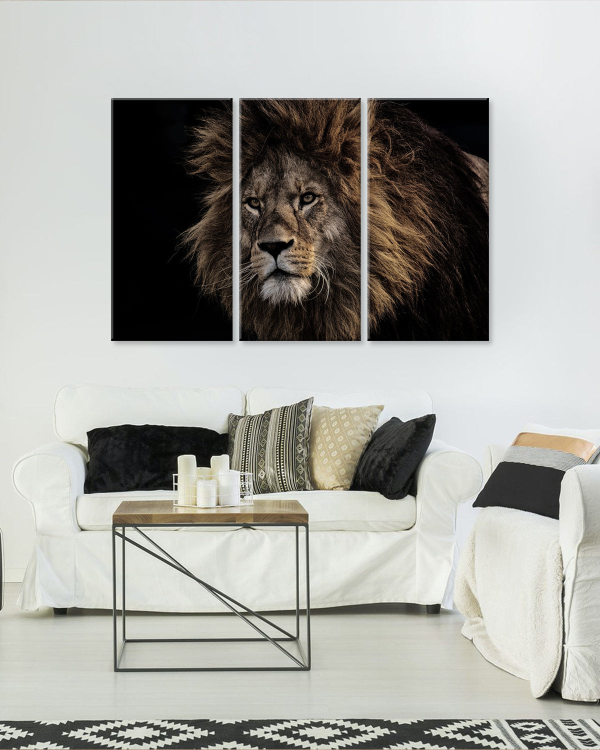 Lion with a Big Mane - Dramatic three-panel canvas print featuring a majestic lion with flowing dark mane against black background, displayed above modern white sofa, perfect as striking wall decor for living spaces