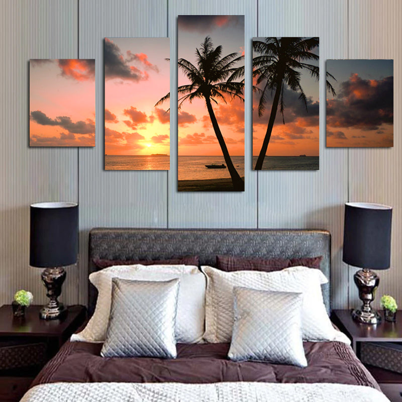 Palm Tree and Sunset - 5-piece canvas wall art featuring tropical palm trees silhouetted against a vibrant orange sunset over ocean waves, creating a peaceful beach scene with dramatic clouds in warm pink and orange hues