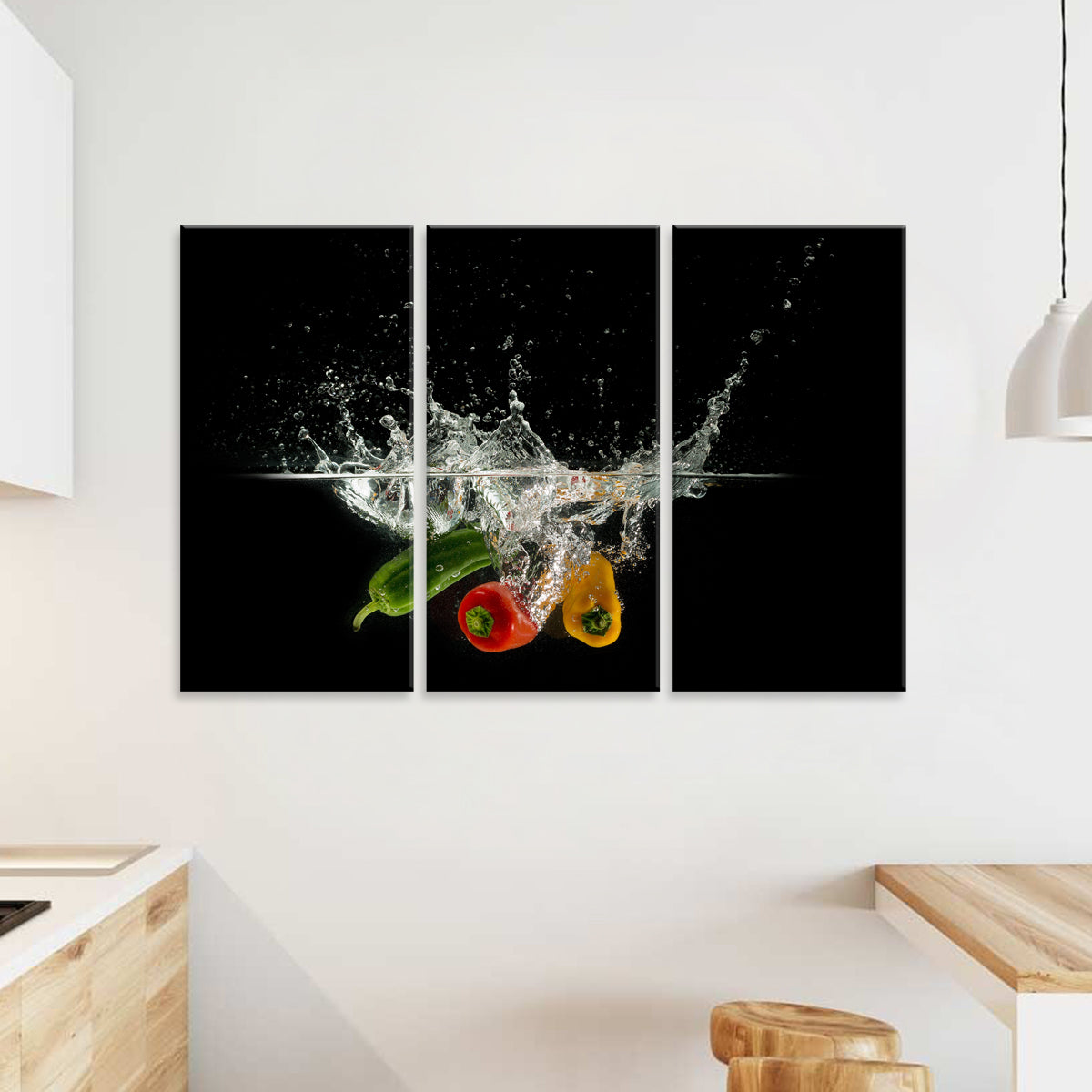Pepper Splash - A dramatic three-panel wall art featuring colorful bell peppers creating dynamic water splashes against a black background, showcasing vibrant red, yellow and green peppers in mid-splash motion