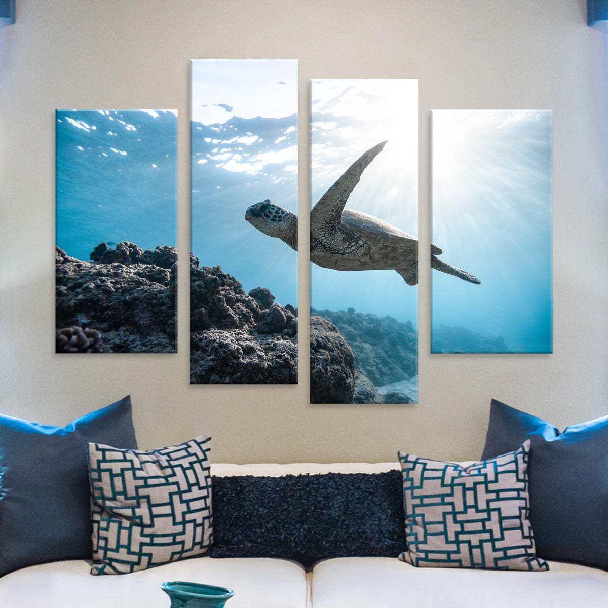 Sea Turtle canvas wall art featuring majestic sea turtle swimming in crystal clear blue ocean waters, surrounded by coral reef and sunbeams, split across 4 panels for dramatic home decor impact