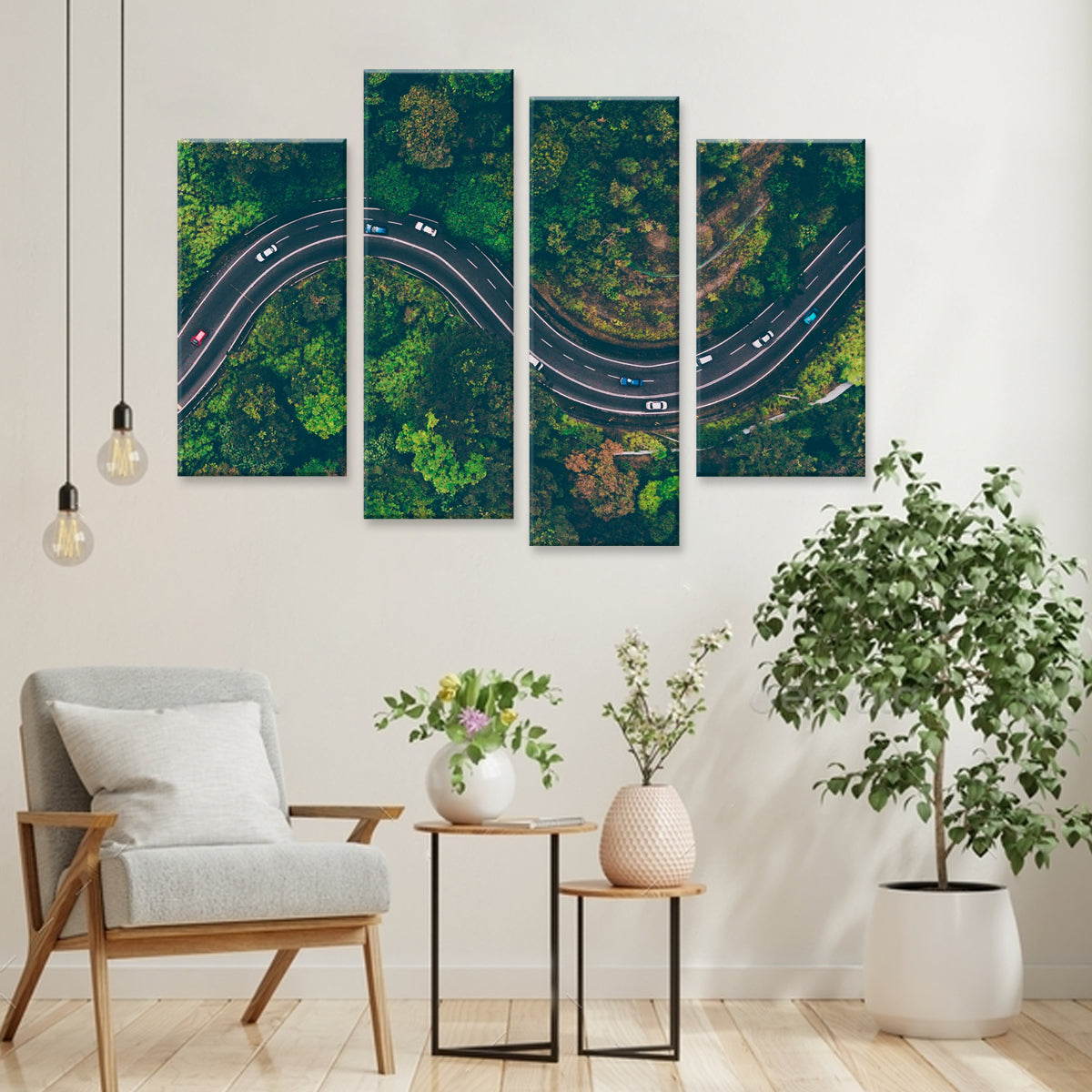 Winding Road - Aerial view of a curved mountain road cutting through lush green forest landscape, captured in a 4-panel canvas wall art print with cars traveling along the serpentine path