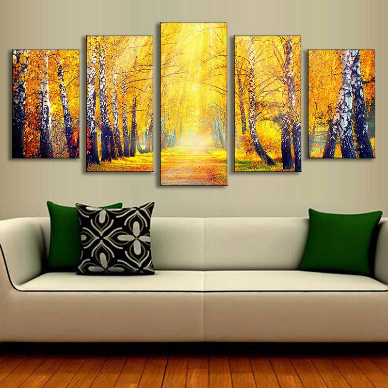 Forest in the Fall: 5-panel canvas wall art depicting vibrant autumn birch trees with golden yellow leaves and white trunks lining a sunlit forest path, creating a warm and serene woodland atmosphere