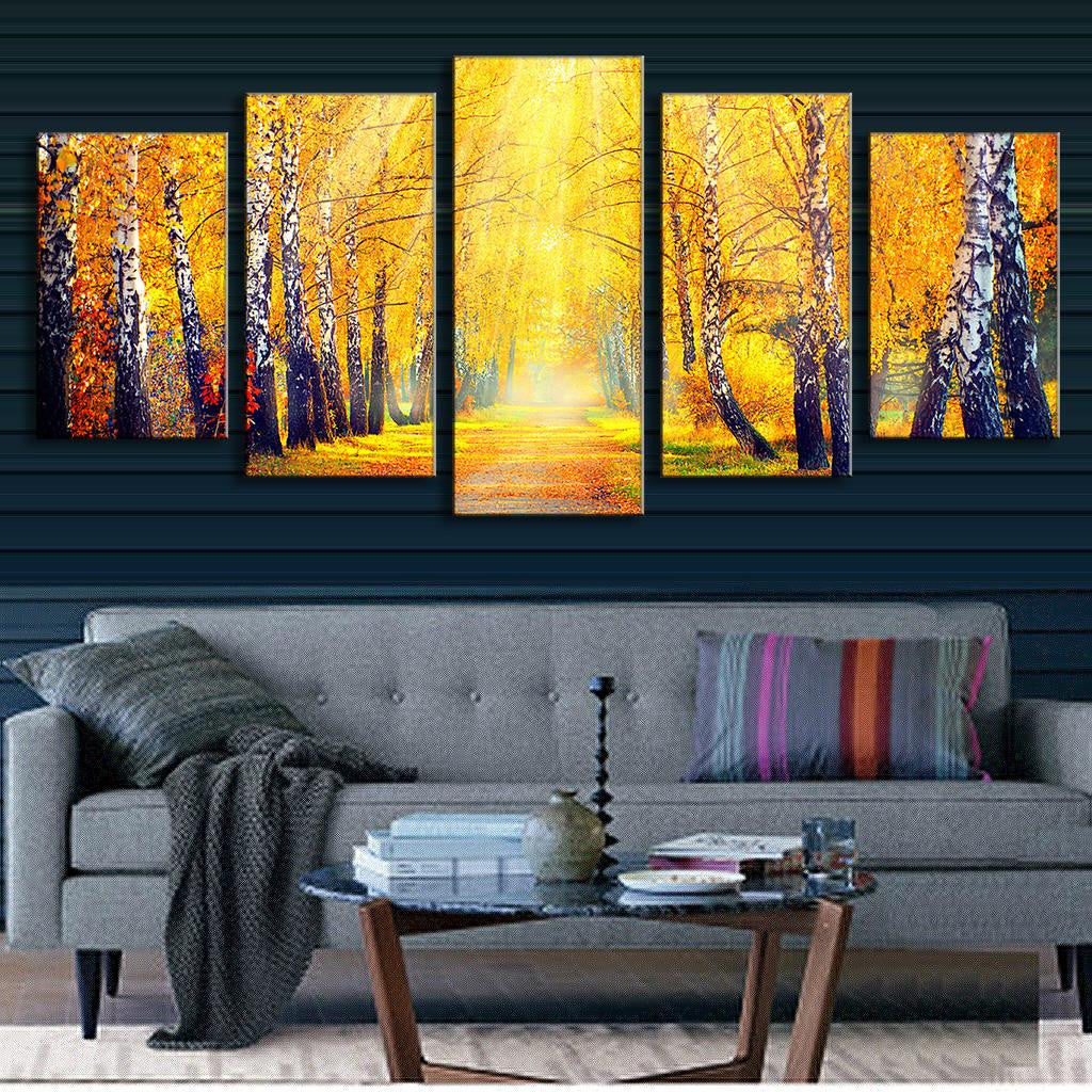 Forest in the Fall - Stunning 5-panel canvas wall art featuring a golden autumn forest path with sunlit birch trees, vibrant yellow leaves, and warm sunbeams creating a peaceful woodland atmosphere. Premium quality canvas print perfect for home decor.