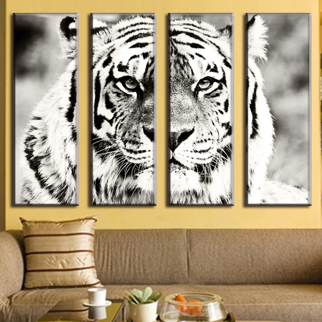 Black and White Tiger - Dramatic 4-panel split canvas wall art featuring close-up portrait of majestic white tiger in monochrome, displaying intense eyes and detailed facial features against blurred background