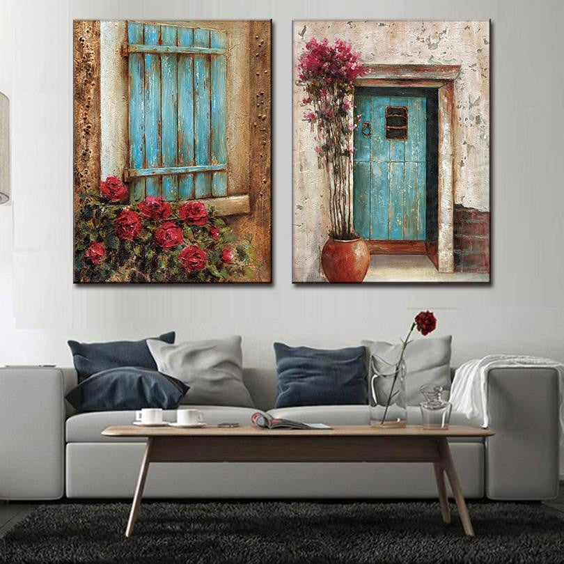 Abstract Window Door Design: Vintage Mediterranean-style turquoise shutters and door with vibrant red roses and climbing vines, set against weathered stone walls, creating a rustic and romantic architectural scene