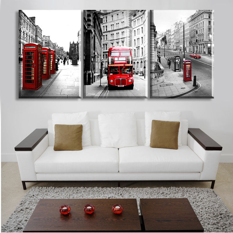 London Landscape Panel Art: Black and white cityscapes featuring iconic red telephone booths and double-decker bus, showcasing classic London streets in a striking three-panel canvas display with selective color highlights