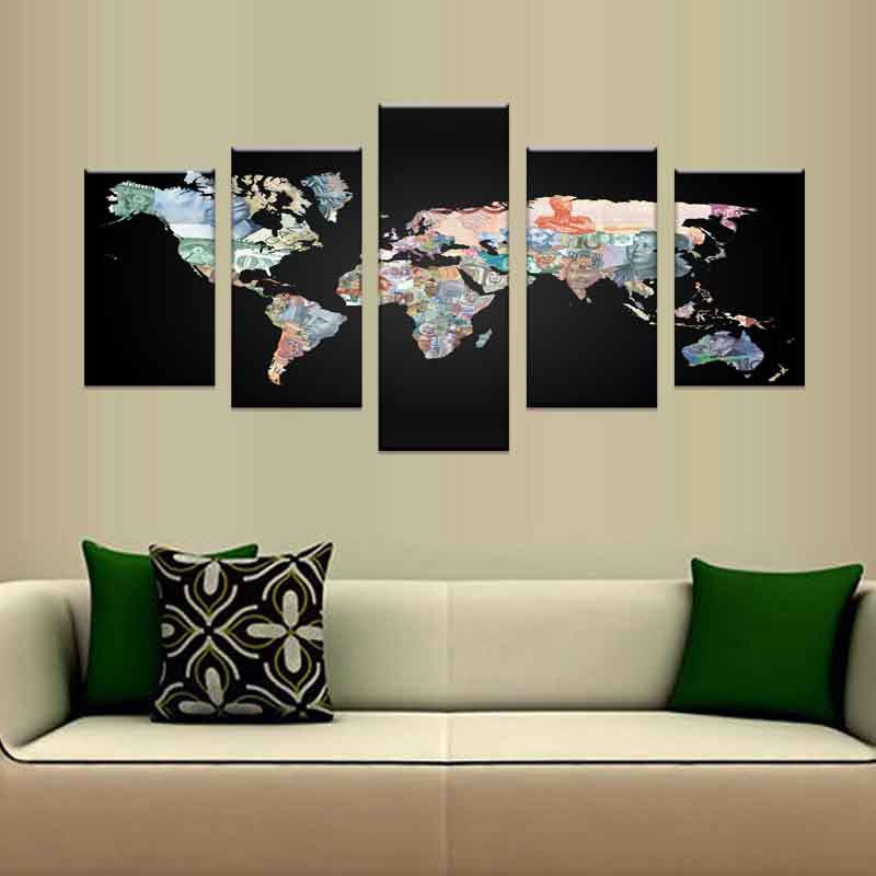 World Map in Currency Notes - 5-panel canvas wall art displaying global map with colorful currency patterns on black background, modern home decor piece shown above white sofa with green accent pillows