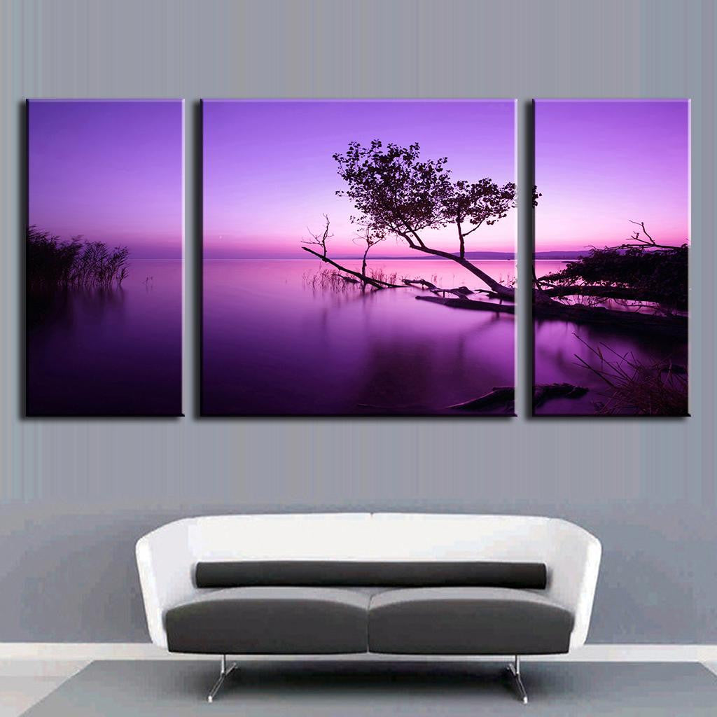 Purple Sky Tree on Water - Stunning 3-panel canvas wall art featuring a silhouetted tree against a vibrant purple sunset sky, reflecting on still water with reeds, creating a serene and dramatic landscape composition