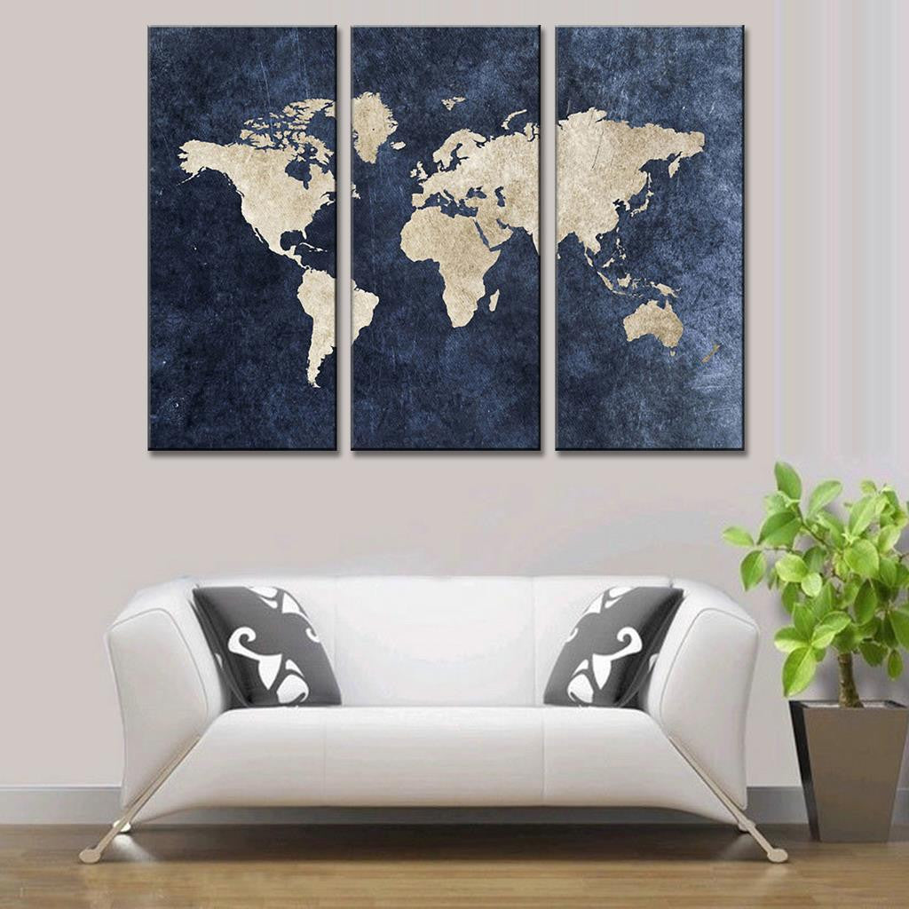 World Map on Navy Canvas - Three-panel wall art featuring a striking cream-colored world map silhouette on deep navy blue textured background, perfect for modern home decor and office spaces