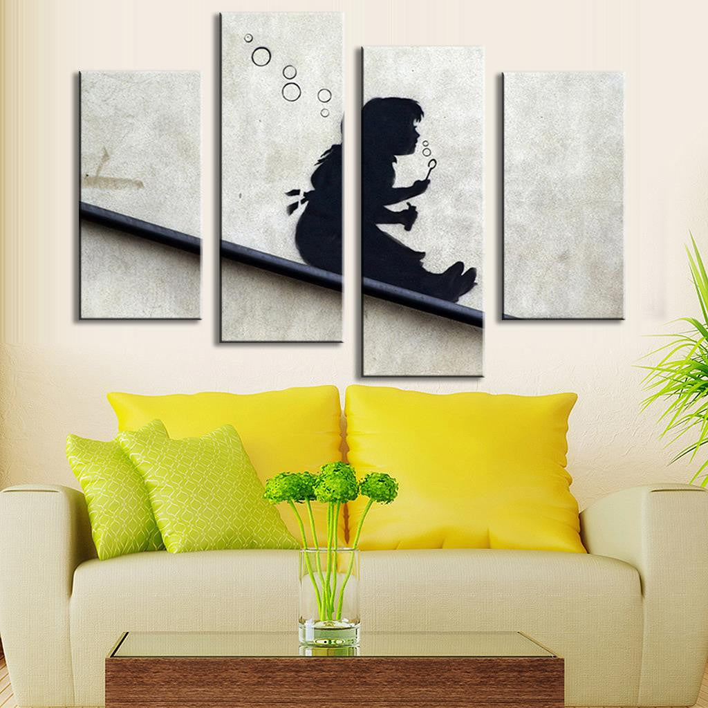 Banksy's Blowing Bubbles On The Roof - black silhouette against white wall, figure sitting on sloped surface blowing bubbles, minimalist street art style 4-panel canvas print