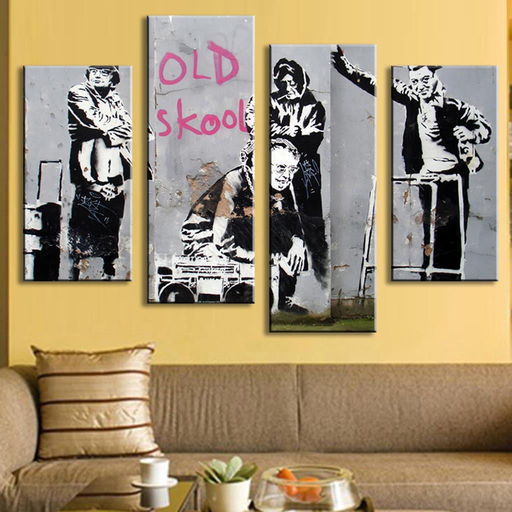 Old Skool Banksy canvas wall art featuring urban street art design in black and pink graffiti style, displayed as 4-panel split canvas print against yellow wall, perfect for modern home decor