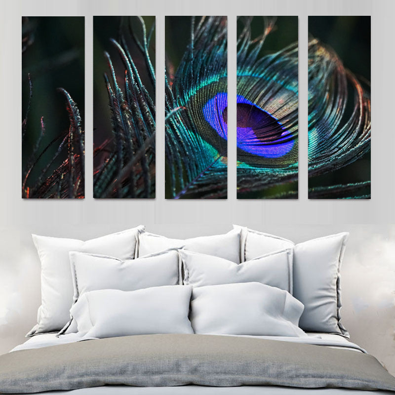 Peacock Feather: Vibrant 5-panel canvas wall art displaying a close-up of an iridescent peacock feather with striking turquoise, blue and purple eye pattern against dark background, mounted above white bedding