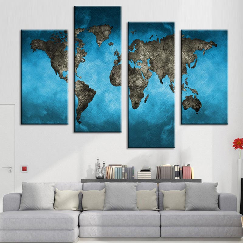 World Map on Blue Canvas - 4-panel artistic wall decor featuring dark continental silhouettes against vibrant turquoise ocean background, creating dramatic contrast in modern world map design