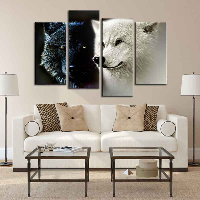 Black and White Wolf Pair: Striking 4-panel canvas art featuring dramatic close-up portraits of two wolves, one black and one white, with piercing eyes, mounted above modern sofa in contemporary living room setting