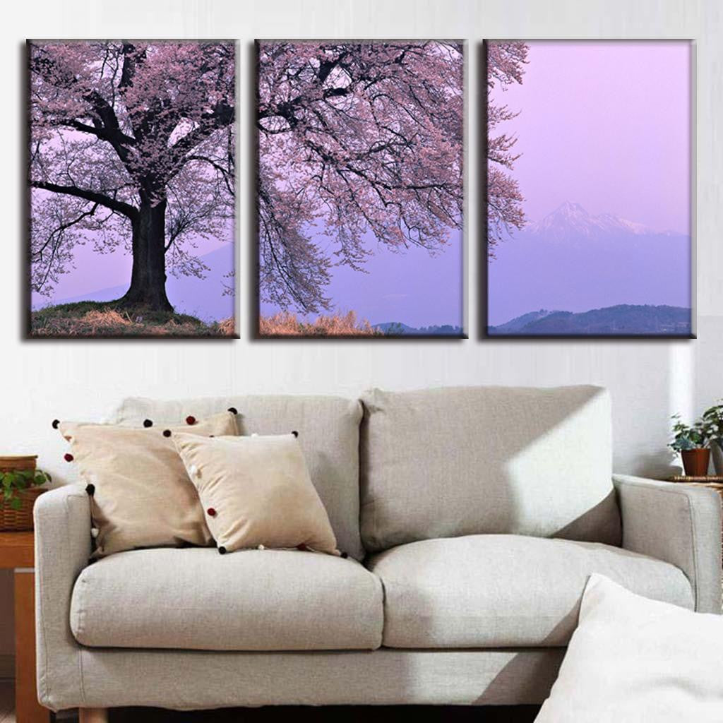 Cherry Blossom in Fog: 3-panel canvas wall art featuring a majestic cherry tree in full bloom against misty purple mountains, showcasing delicate pink blossoms and ethereal morning fog creating a serene Asian landscape atmosphere
