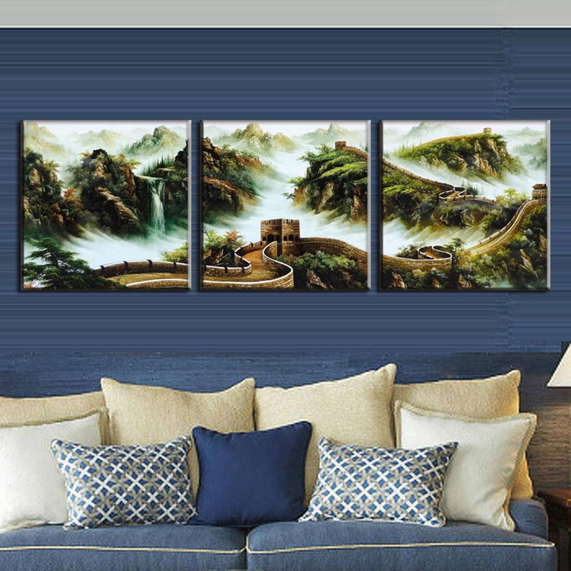 The Great Wall in Fog - 3-panel canvas wall art featuring a misty landscape of the ancient Chinese wall winding through mountainous terrain with waterfalls, displayed in atmospheric green and earth tones, perfect for home decor