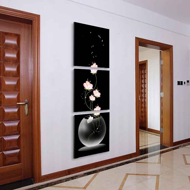 Fishbowl and Flowers - Elegant vertical triptych canvas art featuring delicate pink flowers in a glass bowl against a black background, creating a striking modern wall display for home decor