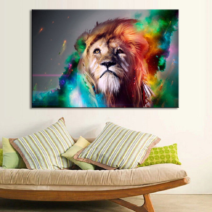 Colorful Abstract Lion wall art featuring majestic lion head portrait with vibrant rainbow colors, swirling green, blue and orange cosmic effects against dark background, displayed above beige sofa with decorative pillows