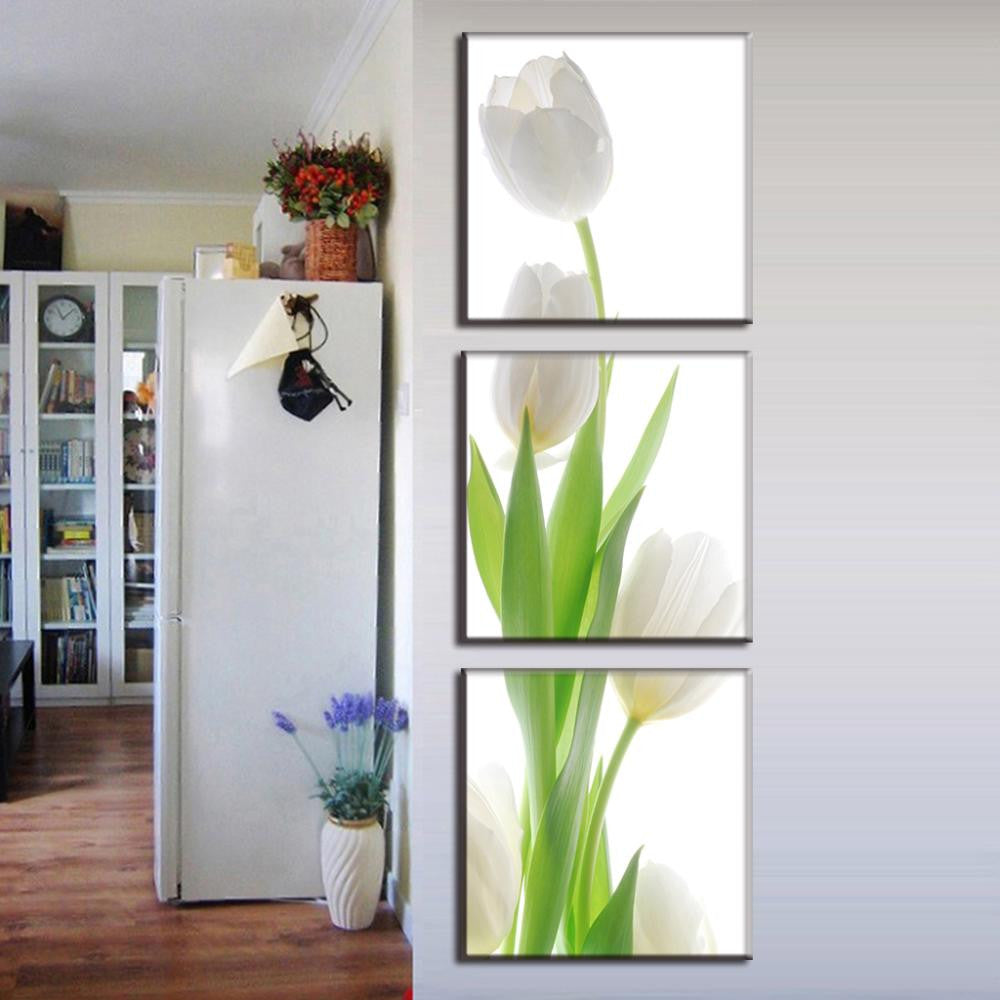 White Tulip Modern Design: Elegant three-panel canvas art displaying crisp white tulips with vibrant green stems against a bright background, creating a minimalist and contemporary wall decor piece for modern interiors