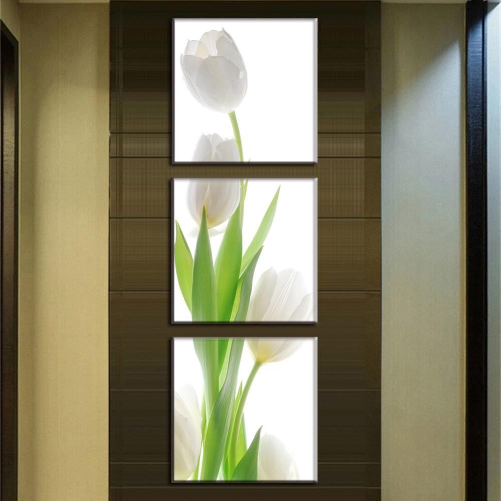 White Tulip Modern Design - Elegant three-panel canvas art featuring delicate white tulips with fresh green stems against a light background, creating a minimalist and sophisticated vertical wall display.
