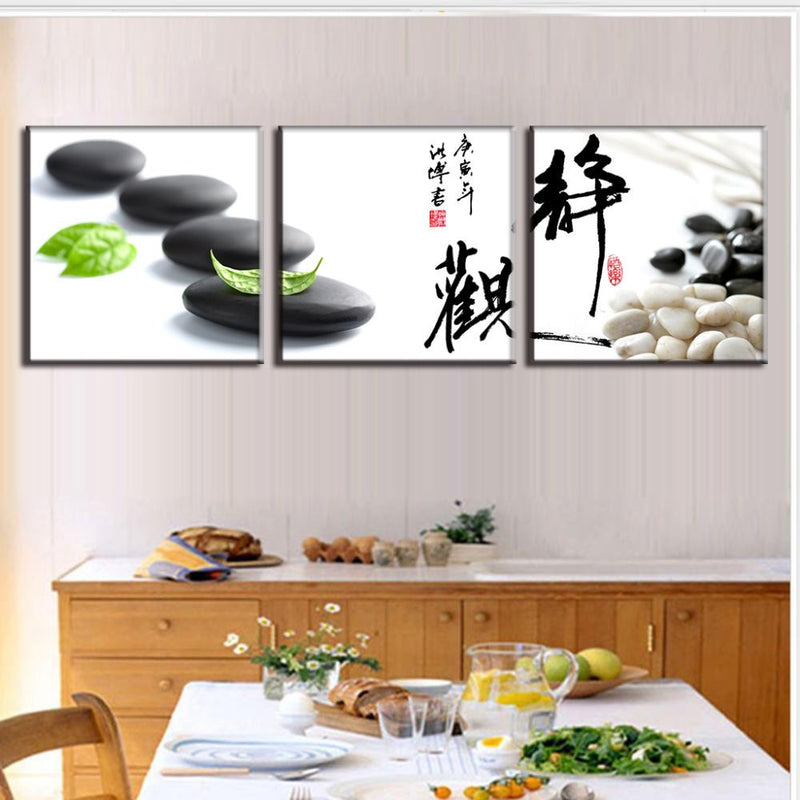 Stone and Leaf with Calligraphy wall art triptych featuring zen stones, fresh green leaves, Chinese symbols, and white pebbles against minimalist background perfect for tranquil home decor