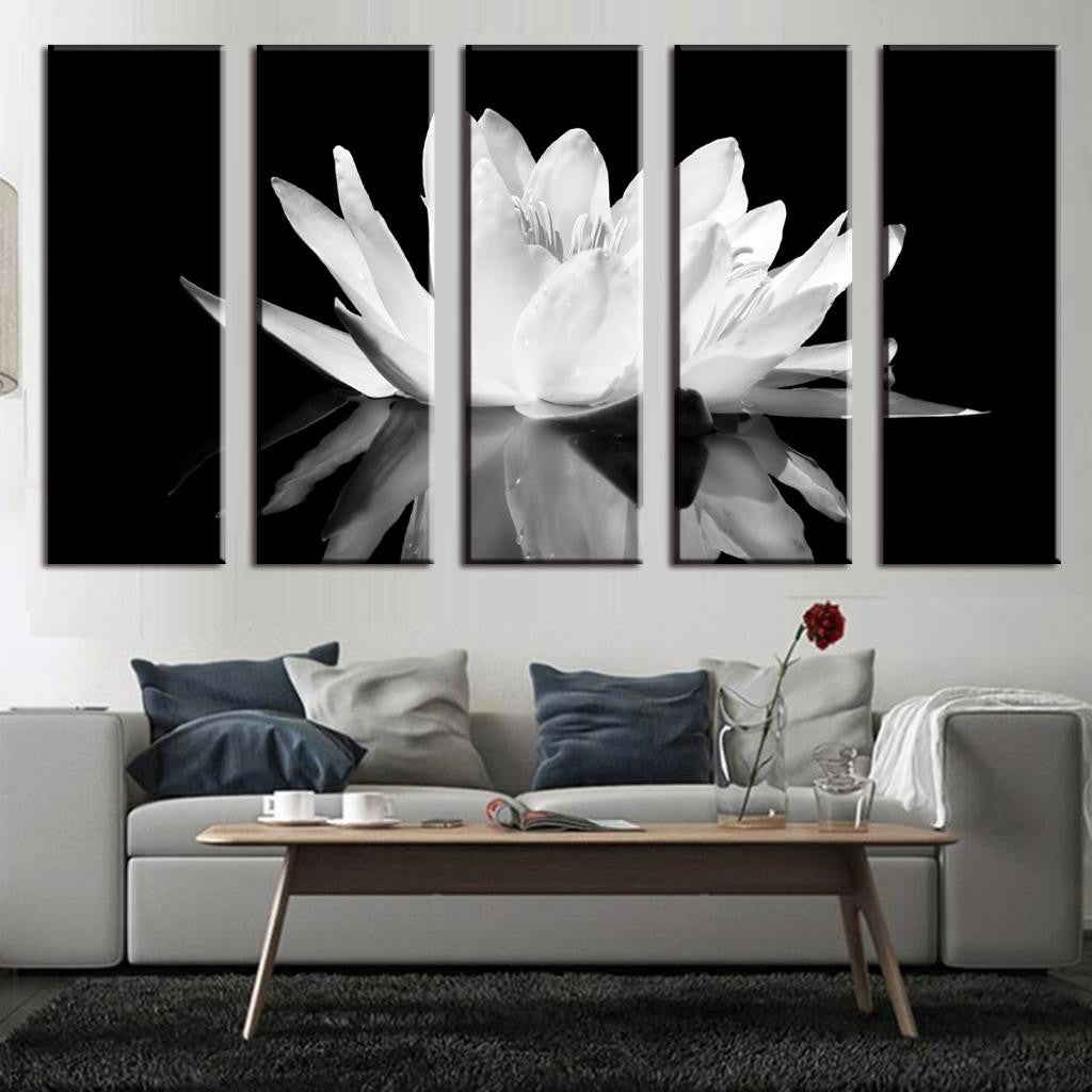 White Lotus on Black - 5-piece canvas wall art featuring a serene white lotus flower in stunning black and white contrast, with delicate petals reflecting on a dark surface. Perfect modern botanical home decor.
