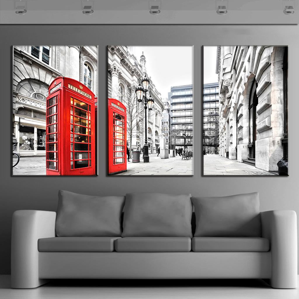 London Scene with Red Telephone Booths - Black and white urban cityscape featuring iconic bright red British phone boxes against classic Victorian architecture, displayed as three-panel canvas wall art