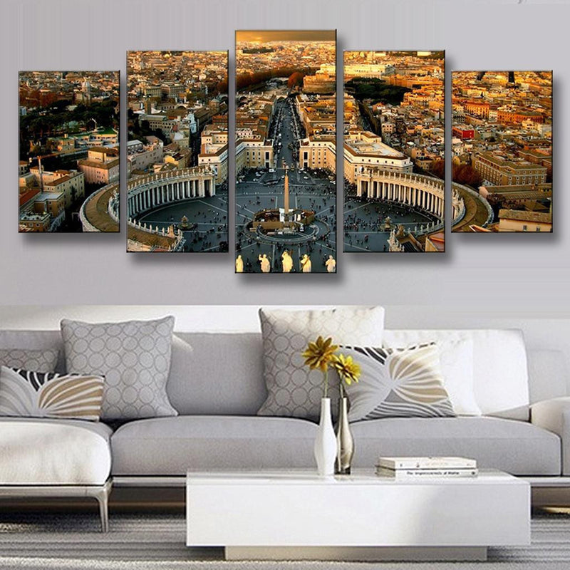 The Roman Forum Panoramic - Aerial view of St Peters Square in Vatican City showing curved colonnades, central obelisk and surrounding historic Roman architecture during golden sunset hour