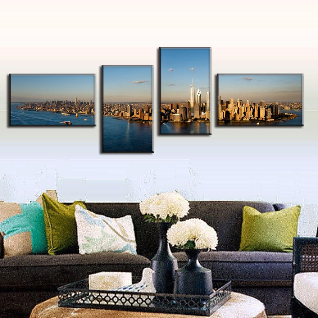New York City Panorama: 4-piece canvas wall art showcasing Manhattan skyline at sunset, with iconic skyscrapers reflected in Hudson River waters, spanning 48x24 inches total in vibrant golden hour lighting