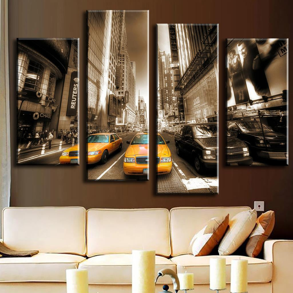New York Streets - Yellow Taxis canvas wall art featuring sepia-toned cityscape with iconic yellow NYC taxis on busy Manhattan street, surrounded by towering skyscrapers, split across 4 modern panels