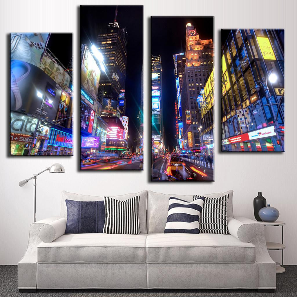 Times Square - Lights at Night: Vibrant 4-panel canvas art showcasing illuminated skyscrapers, colorful billboards, and neon lights of Times Square NYC at night, capturing the bustling cityscape's energetic atmosphere and iconic urban landscape