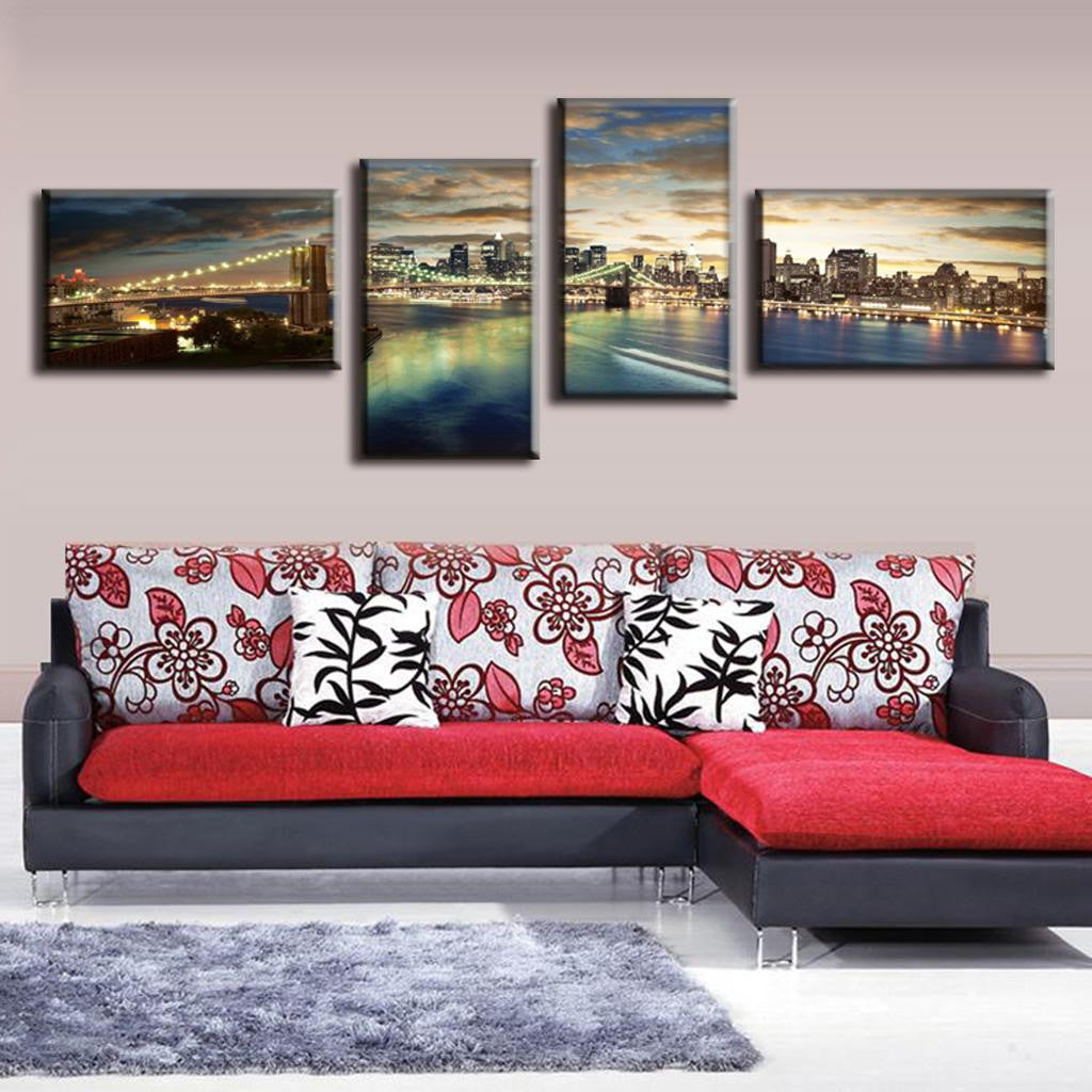 Brooklyn Panoramic at Night: 4-panel canvas art showcasing illuminated Brooklyn Bridge and Manhattan skyline reflecting on East River waters at dusk, with dramatic sunset clouds and city lights creating a stunning cityscape view.