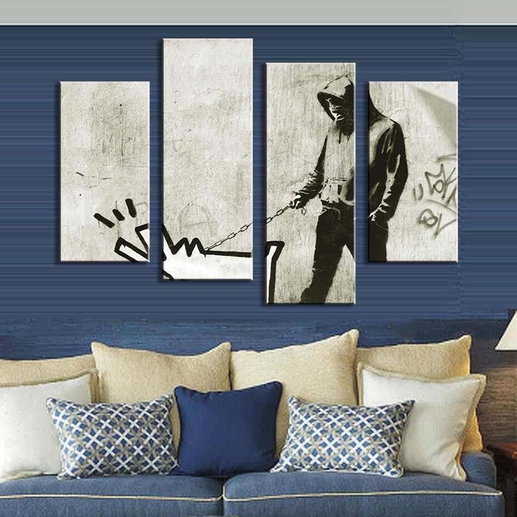 Walk the Dog Banksy canvas wall art displaying a black and white graffiti-style composition split across four panels, featuring a silhouetted figure walking a stick-figure dog on a leash against a textured light background