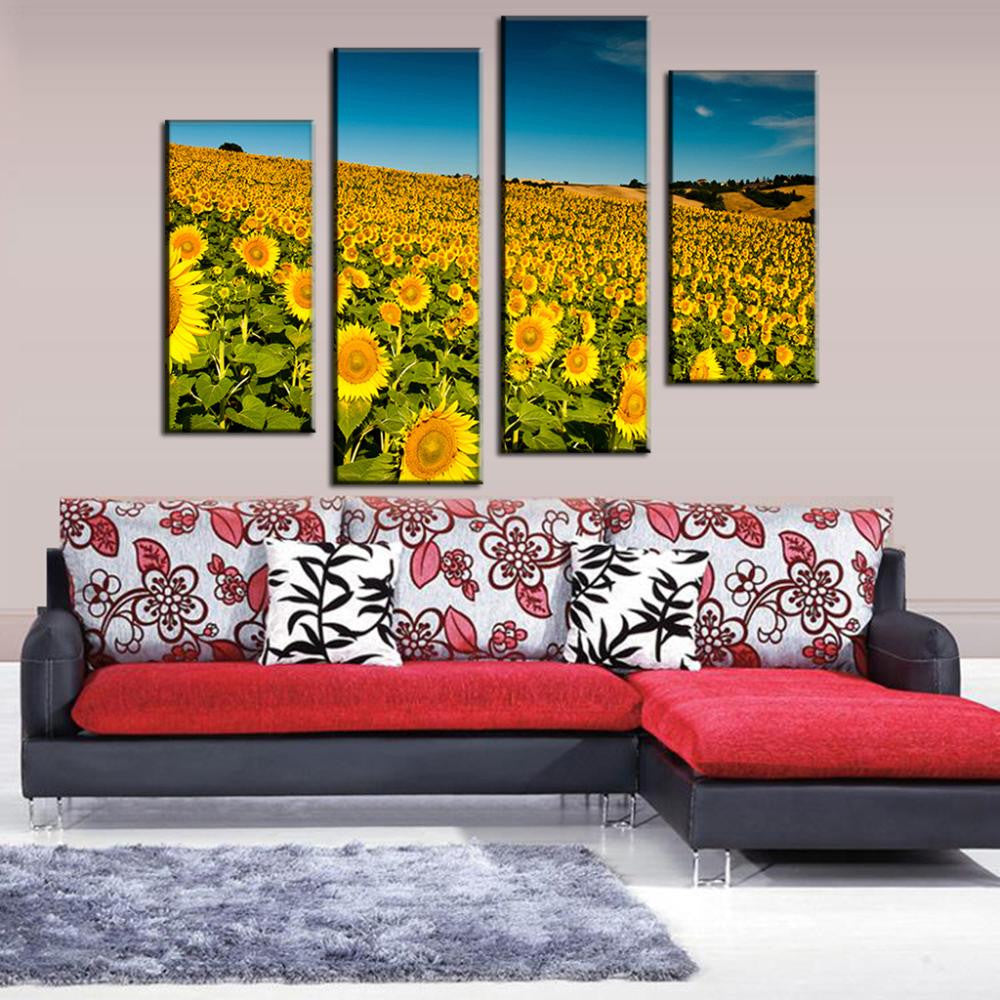 Field of Sunflowers canvas wall art displaying vibrant yellow sunflowers stretching across rolling hills under bright blue sky, split into 4 vertical panels perfect for modern home decor and interior design