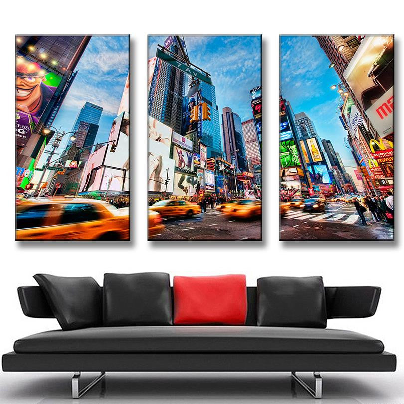 City Landscape 3-panel canvas art featuring vibrant Times Square New York cityscape with iconic yellow taxis, towering skyscrapers, bright digital billboards and bustling streets against blue sky captured in dynamic perspective