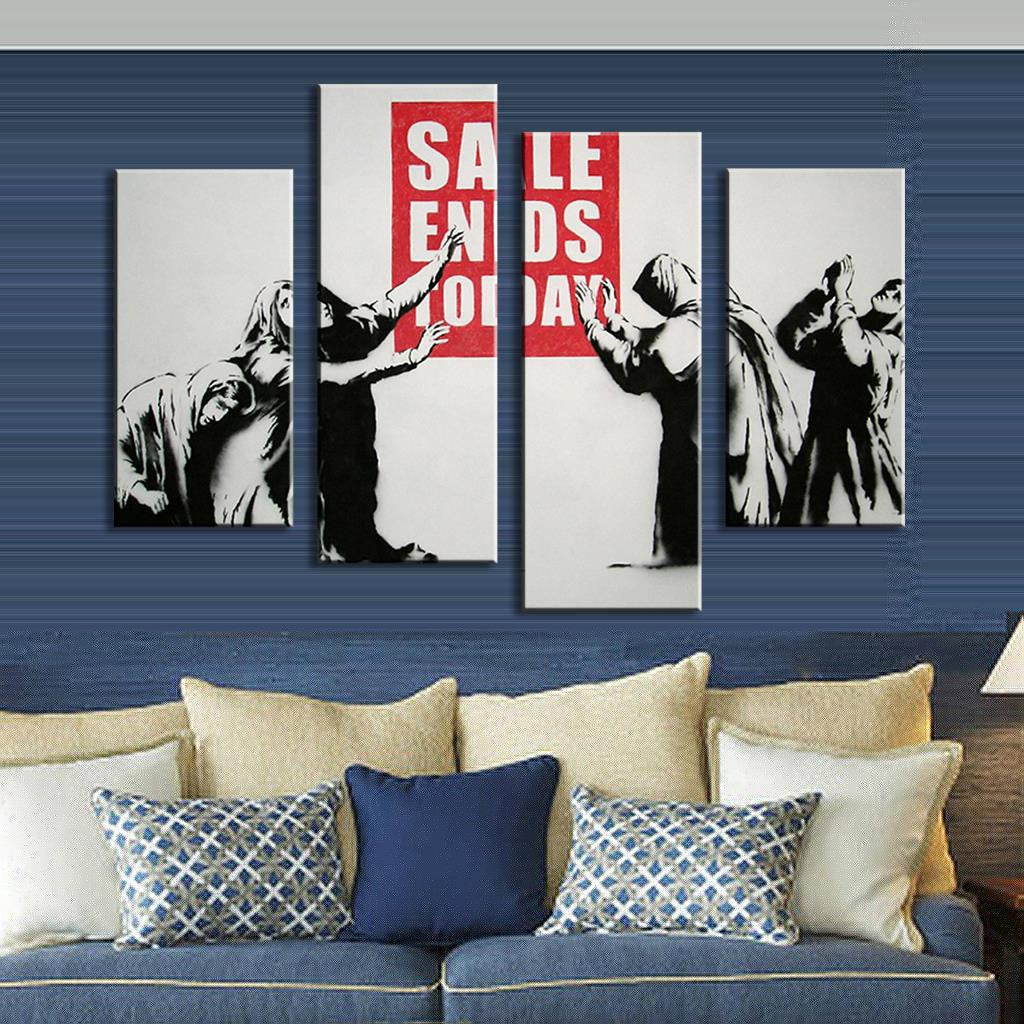 Banksy Sale Ends Today 4-panel canvas art print showing silhouetted figures grabbing at a red sale sign, displayed above a blue couch with decorative pillows
