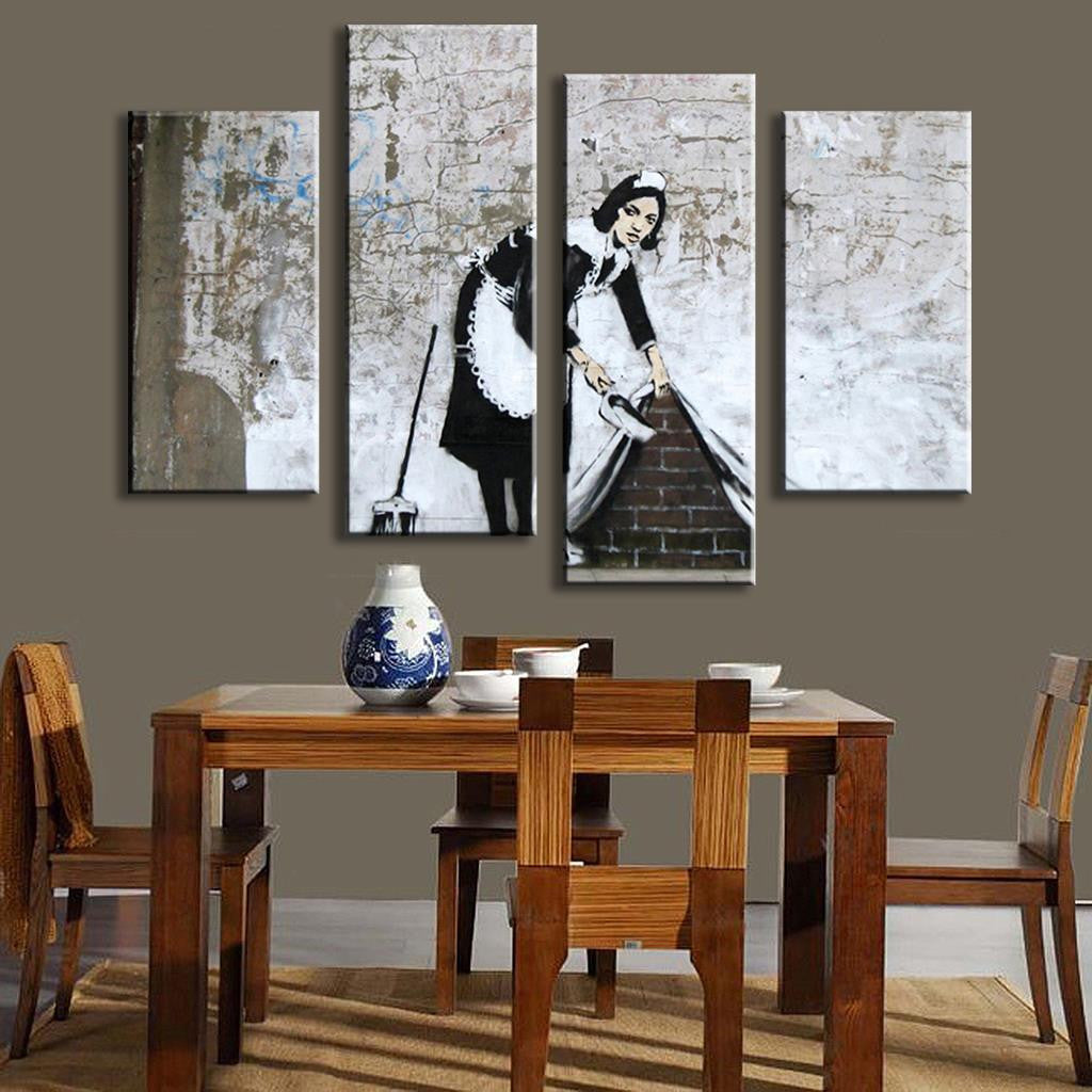 Banksy Maid - 4-panel canvas wall art featuring iconic black and white stencil design of figure in maid outfit sweeping against distressed white wall, modern street art style print for home decor
