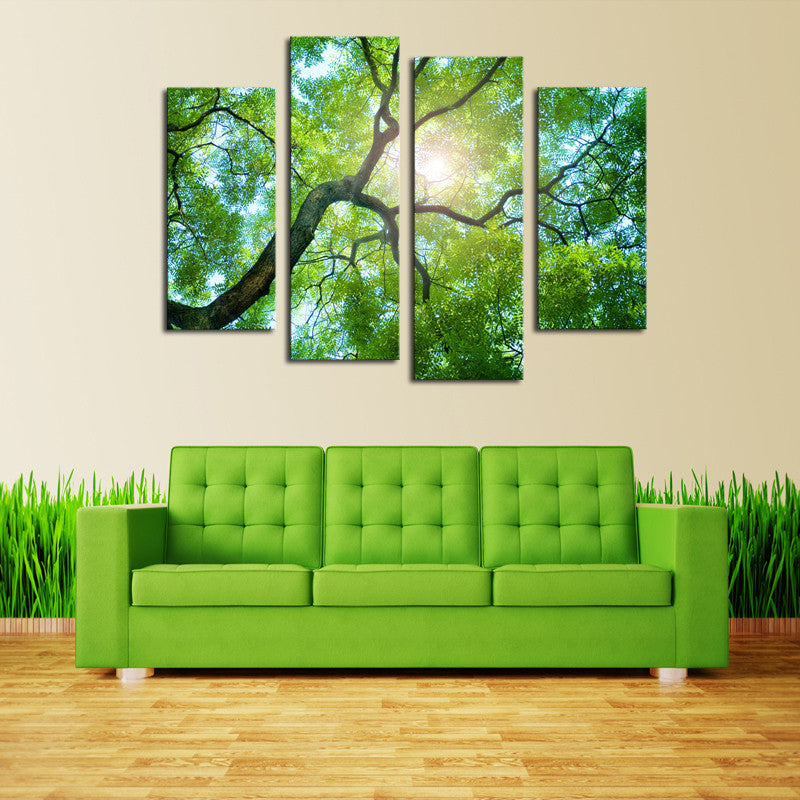 Sunlight Behind Tree - 4-panel canvas wall art showing bright sunlight filtering through lush green tree branches against a clear sky, creating a serene forest canopy view perfect for nature-inspired home decor