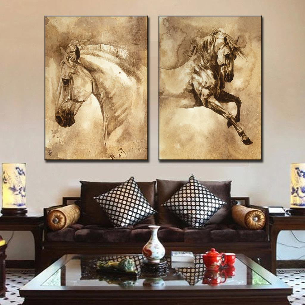 Horses on 2 Piece Canvas - elegant sepia-toned wall art featuring two dynamic horse portraits, one showing a noble profile and another in motion, displayed above a modern living room sofa in artistic watercolor style