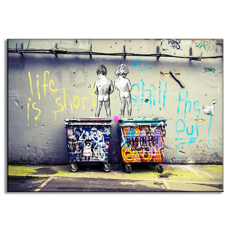 Urban street art print "Life is Short, Chill the Duck Out" featuring graffiti mural with two figures standing on dumpsters against a concrete wall with spray-painted text and colorful graffiti designs, canvas wall decor