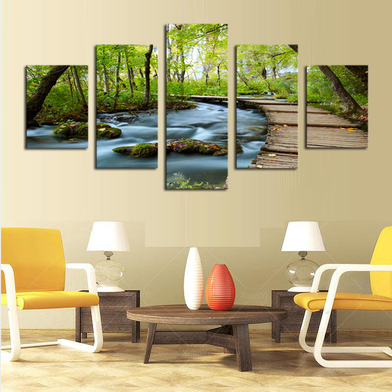 Woods and Waterfalls 5-panel canvas art featuring a serene forest stream with wooden walkway, flowing water over rocks, lush green trees, and natural sunlight filtering through the canopy
